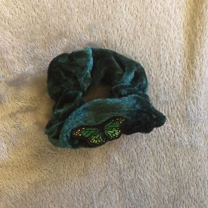 Dark green scrunchie with a butterfly